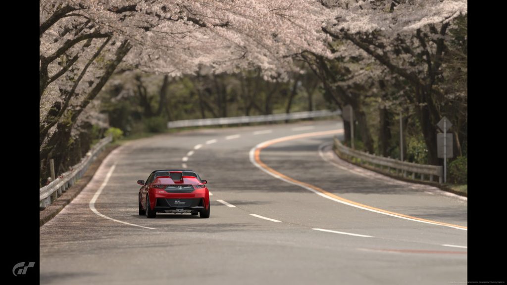GT7のスケープスで満開の桜並木を駆け抜けるS660のリアビュー